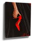 Realistic painting of a feminine hand holding a red stiletto on a black background – fashion wall art print