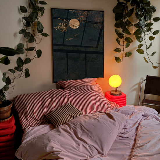 Moon and Cherry Blossom Night Poster — Kids room scene (boy with lamp)
