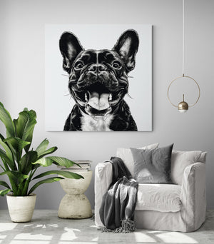 bright living room, comfy chair, grey cushion and blanket, modern side table, large green plant, hanging lamp, dog wall art.