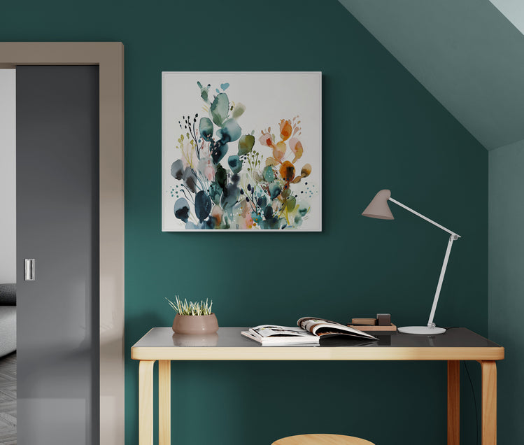 Toile abstraite aux fleurs multicolores dans un bureau minimaliste.