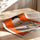 Poster femme lisant livre fond orange vif marinière vernis rouge art moderne déco murale — passe-partout blanc