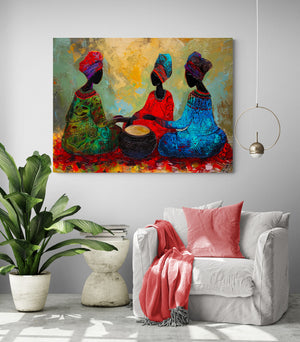 living space with comfortable chair, red cushion and throw, side table, large green plant, African women art piece.