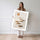 Poster Galets zen - Chemin de pierres sous un soleil doré — Vierge - poster-femme-debout — passe-partout blanc