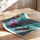 Poster mural Orchidées violettes - Élégance fleurie sur fond turquoise — Vierge - poster-enroullé — passe-partout blanc