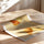 Poster Papillon doré - Reflet lumineux et envol paisible — Vierge - poster-enroullé — passe-partout blanc