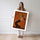Poster Trompettiste jazz - L'énergie brûlante d'un solo sur fond orange — Vierge - poster-femme-debout — passe-partout blanc