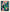 Colorful abstract art of an embracing couple, green and navy on a coral background