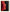 Tableau abstrait formes organiques rouges orangées sur fond noir texture moderne