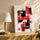 Red and black abstract painting with deconstructed geometric shapes