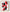 Œuvre abstraite sur fond blanc, composée de rectangles rouges et noirs superposés avec des effets de grattage. Style brut, dynamique, sans encadrement ni éléments décoratifs autour.
