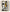 Tableau abstrait visage stylisé lignes noires expressives touches ocre et gris art moderne