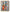 African wall art with two women carrying water jars, colorful traditional attire, modern style