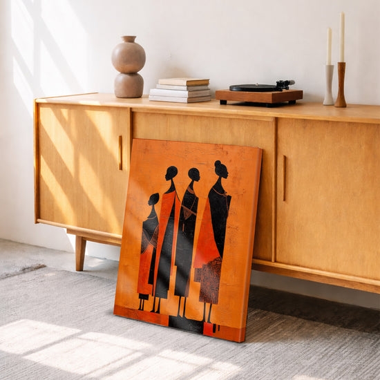 Tableau africain femmes stylisées silhouettes noires fond orange décoration salon moderne buffet rétro