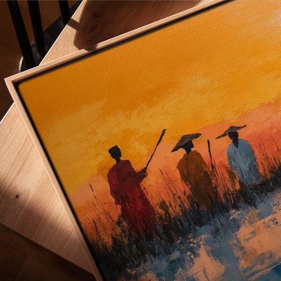 Tableau africain pêcheurs en pirogue coucher de soleil tons orangés bleus décoration salon cadre chêne