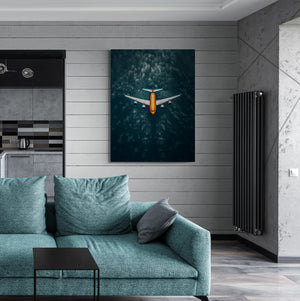 Wall art with airplane canvas adding escape and serenity to a contemporary living room