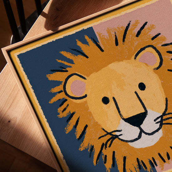 Lion wall art in oak-gold frame — nursery decor with mustard-yellow lion on blue and pink