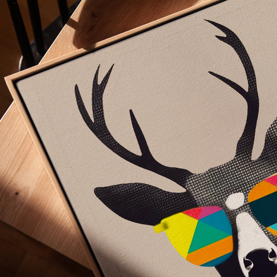 Stylized deer with colorful glasses wall art for a Scandinavian/Nordic living room