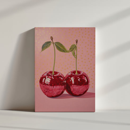 toile, deux cerises boule de disco, queue de cerise, fond rose bout feuilles d'or.