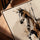 Abstract horse wall art with expressive black and beige brushstrokes, oak frame
