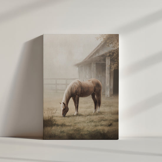 Palomino horse grazing by a wooden barn – peaceful farmhouse country scene