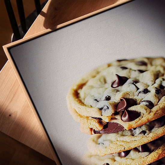 Chocolate chip cookies canvas print for living room, framed in golden oak
