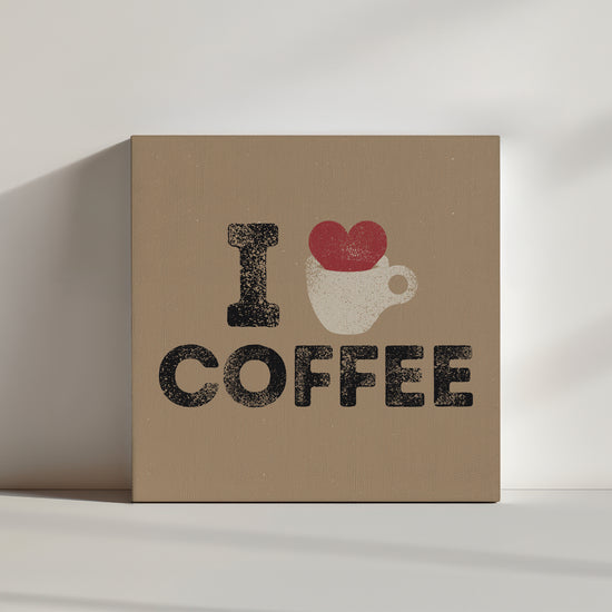 Dark beige kitchen wall art featuring a red heart spilling from a white coffee cup, bold black I LOVE COFFEE typography, vintage faded look