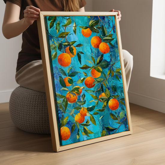 Turquoise oranges canvas wall art hanging in a living room, modern Mediterranean decor