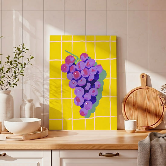 Modern wall art featuring purple, pink and yellow pop art grapes over a retro tile background