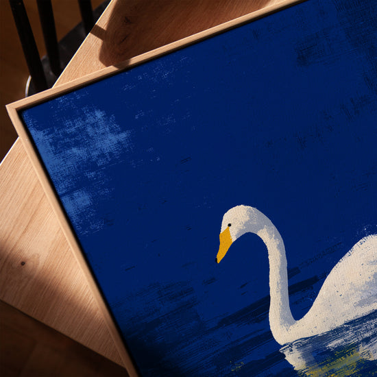 Textured white swan art print with orange beak detail, serene blue water and shimmering gold accents
