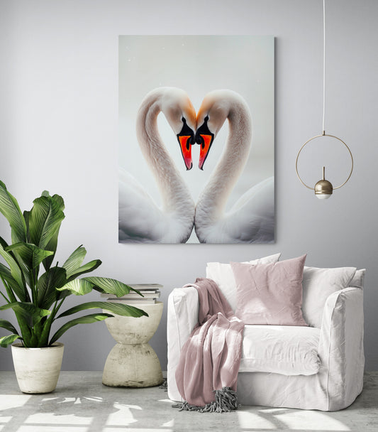 toile xxl de cygnes formant un cœur au-dessus d'un canapé confortable.