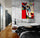 Colorful Cow Canvas in an Industrial Loft Bedroom – Striking Contrast Between Raw Decor and Vibrant Art