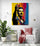A vibrant pop art painting featuring elegant Freddie Mercury, majestically displayed on a sleek living room wall.