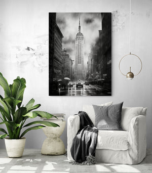 Black and white New York wall decor, enriching a cozy living room with a reading nook and white chair