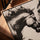 Black and white wall art of two horses facing off for industrial loft living room decor