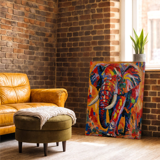 Tableau éléphant multicolore moderne touches vives pour décoration salon mur brique fauteuil cuir camel