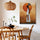 Tableau ethnique femme africaine soleil orange textures terreuses décoration salon salle à manger