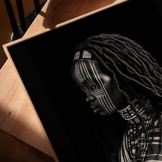 Black and white African woman with tribal face paint – wall art in golden oak frame for living room