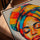 Femme africaine turban coloré toile pour salon cadre chêne doré