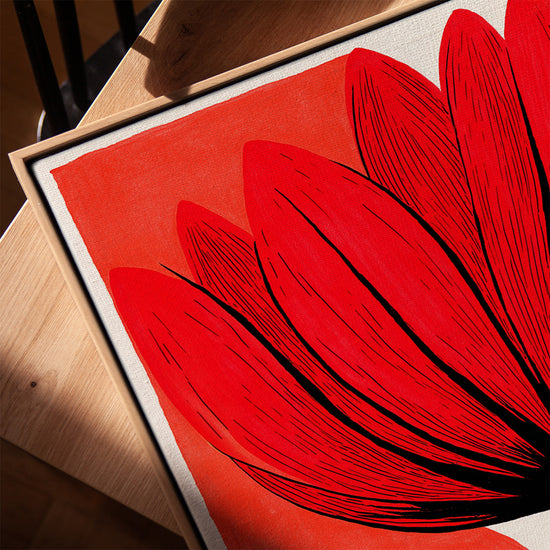 Red flower canvas with coral backdrop in modern living room, oak frame