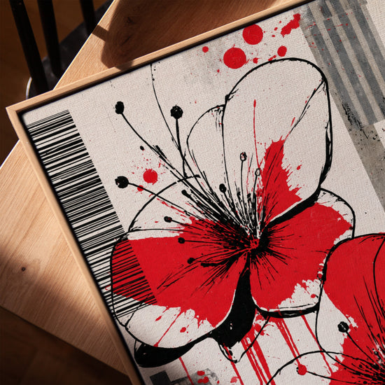 Tableau fleurs rouges style contemporain abstrait sur cadre chêne doré posé sur table salon