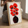 Leinwandbild mit stilisierten roten Blumen und schwarzer Vase – Wanddekoration für modernes Wohnzimmer mit Holzrahmen