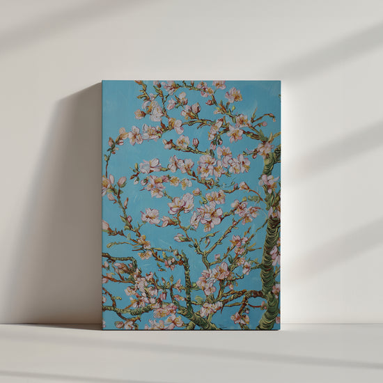 Tableau floral avec branches de cerisier en fleurs sur fond bleu pastel, style impressionniste