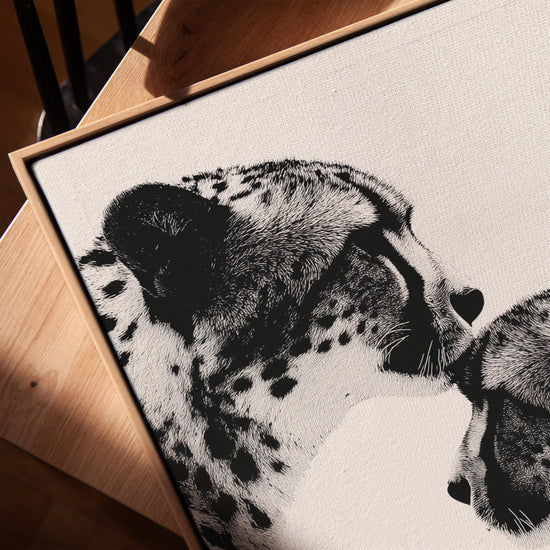 Black and white cheetah family portrait canvas art with oak frame