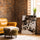 Tableau sur toile léopard tacheté sépia beige style expressif décoration salon mur brique fauteuil cuir
