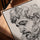 Thinker face line art wall art in a golden oak frame for the living room