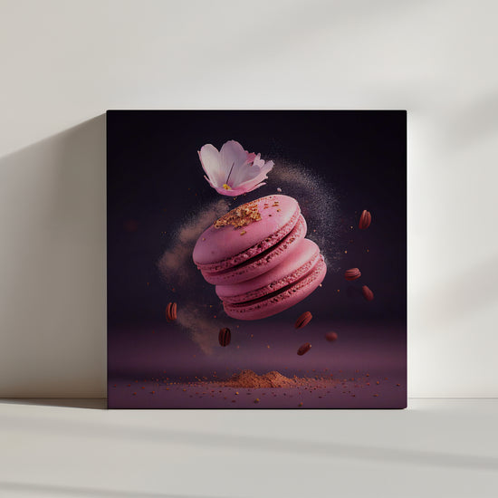 Floating pink macarons canvas print with powdered sugar, gold dust, and cherry blossom on an energetic burst background