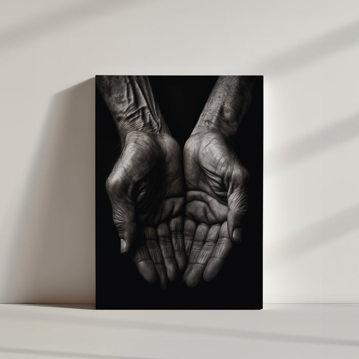 Striking contrast between a dark background and clasped hands in a storytelling black and white wall art print