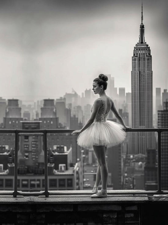 Black and white photo of a dancer with skyscrapers