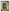 Tableau mural gamer avec personnage pixelisé vert sur fond éclaboussé multicolore, style pop art