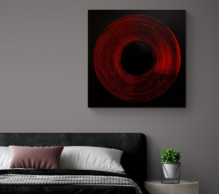 Tableau zen 'Red Circle' insufflant énergie positive dans une chambre parentale.